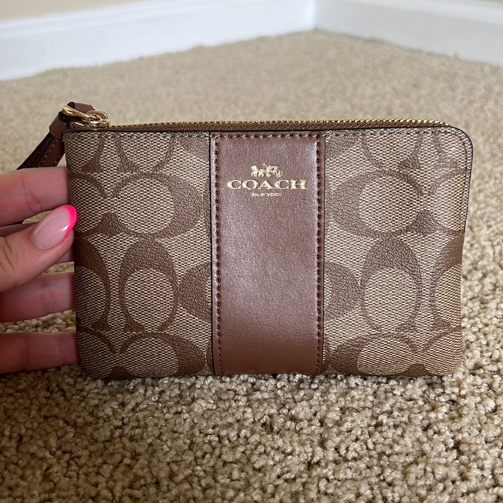 Brand new Coach wristlet